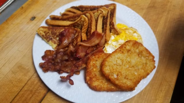 French Toast with Sausage Home Fries platter choice of coffee or orange juice.
