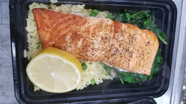 Lent Special Grilled Salmon Over Vegetable Medley and Rice.