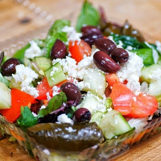25s. Greek Salad with grilled flamed chicken