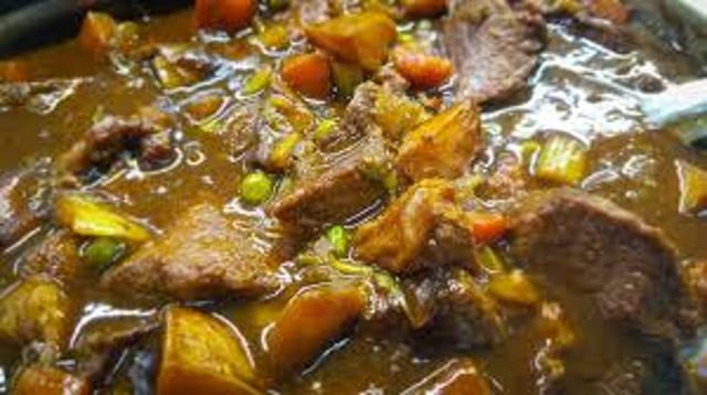 Beef Stew Over Mashed Potatoes.