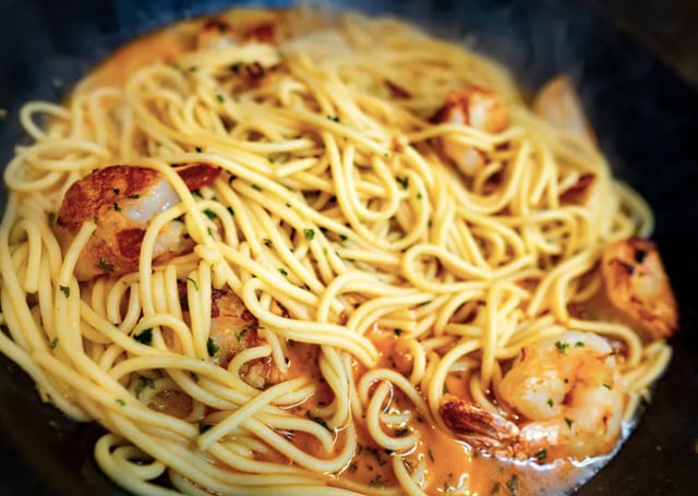 Shrimp Scampi Over Penny Pasta & Salad.
